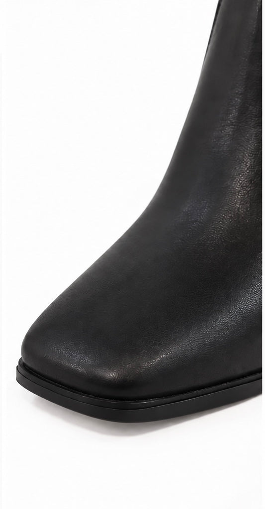 Botas altas negras de tacón