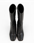 Botas altas negras de tacón